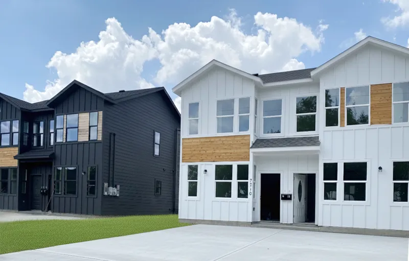 Completed black and white duplexes at a Mindful four-unit ground-up development in Houston, Texas
